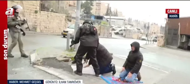 İsrail polisi A Haber kameramanına vurdu! Namaz kılan engelliye gözaltı