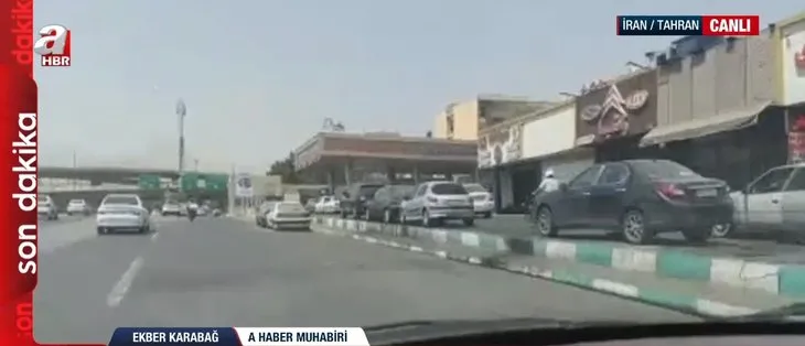 Dünyanın merak ettiği Tahran sokaklarından tek canlı yayın A Haber’de! Üst geçitte dikkat çeken pankart
