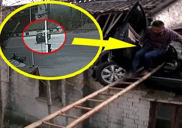 Kontrolden çıkan otomobil evin çatısına uçtu