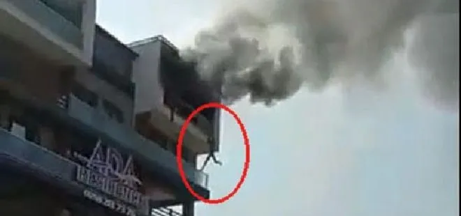 Yangında mahsur kalan vatandaş alt balkona atladı