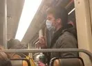 Metroda korkunç görüntü! Elini defalarca ağzına götürüp direğe salyasını bulaştırdı |Video