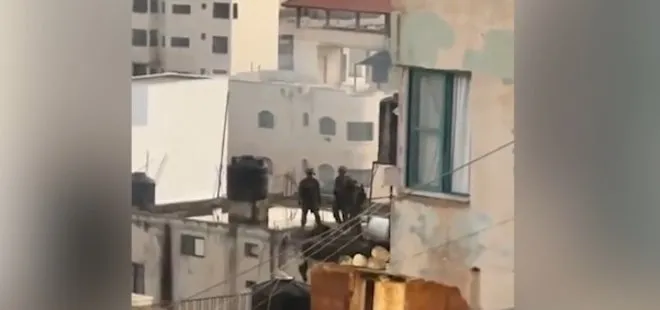 İşgalci İsrail askerleri Filistinli şehitleri çatıdan attı! BM ve ABD İsrail askerlerinden rahatsız