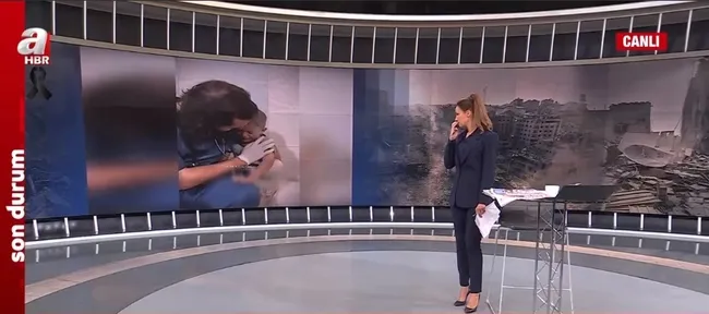 katil-israil-cocuk-katliami-korkudan-tir-tir-titredi-a-haber-spikeri-cansin-helvaci-tepki-gosterdi-1697700795011.jpg Katil İsrail'in çocuk katliamı | Korkudan tir tir titredi! A Haber spikeri Cansın Helvacı tepki gösterdi - 1