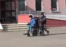 Bedensel engelli sıra arkadaşının eli, ayağı oldu