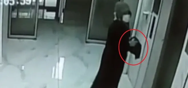 Kayseri’de koronavirüs paniği! Binalara giren kadın elindeki kimyasalı sürdü |Video