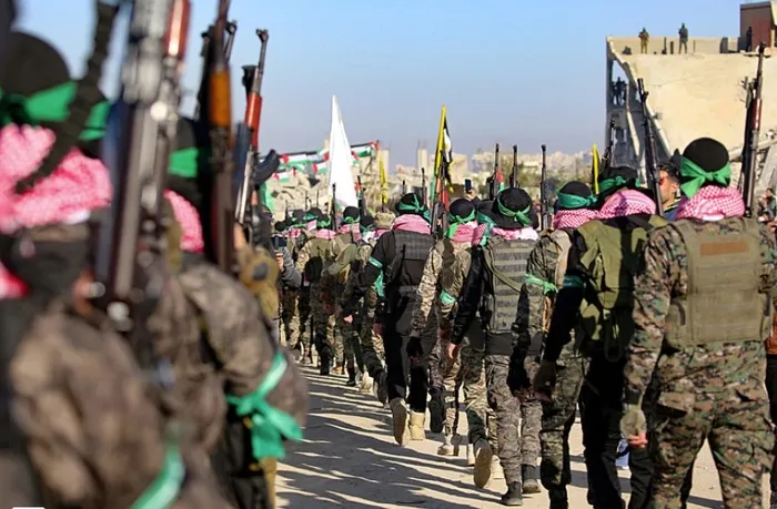 abdden-israile-tonluk-bomba-sevkiyati-ateskesi-bozan-bibiyi-siyonist-medya-topa-tuttu-yalanci-1739699957333.jpg Hamas'ın askeri Kanadı İzzettin El Kassam Tugayları (AFP)
