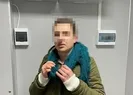 Eşinin kılığına girip ülkeyi terk etmeye çalıştı!
