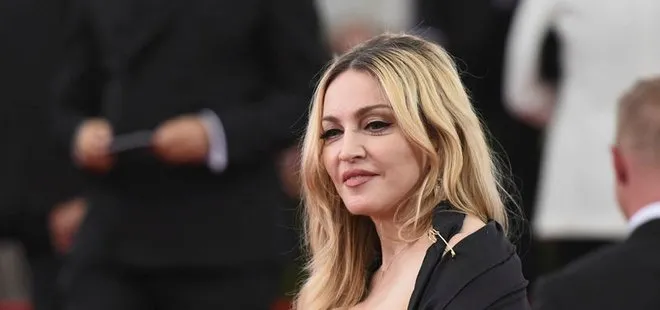 Madonna İngiliz haber sitesinin tazminatını kabul etti