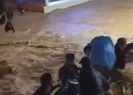 Vatandaşlar göle dönen yolda karşıya halatla geçti