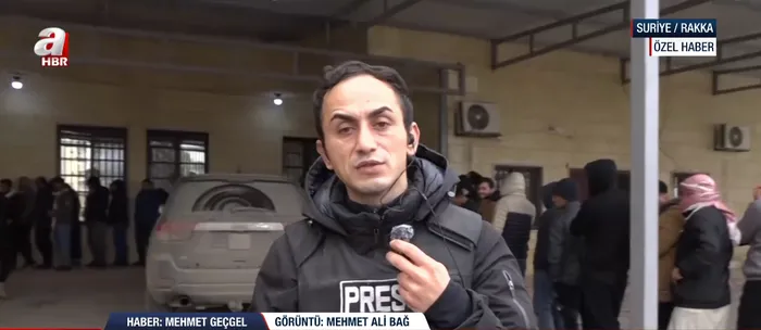 suriyede-ypgnin-cokusu-rakkada-af-merkezlerinde-uzun-kuyruklar-1769605407520.png (foto:ahaber.com.tr)