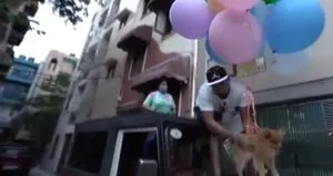 Köpeğini uçan balona bağlayıp...