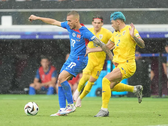 Lider Romanya! Slovakya ile berabere kalarak yola devam...