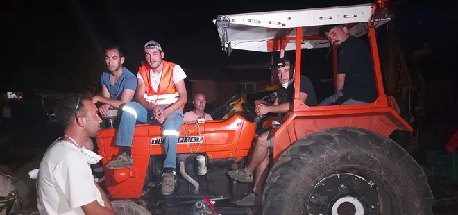 Marmaris’te traktör üstünde yangın nöbeti