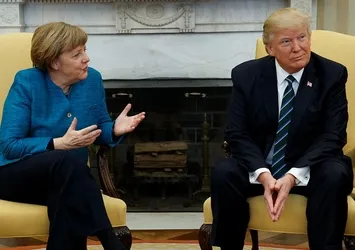 Trump, Merkel'in elini neden sıkmadı?