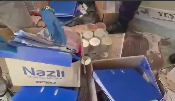 Kuriş'in mali ağına yeni darbe! İhbarla gidilen evden klasörler dolusu belge çıktı | Bağış listeleri ve banka kayıtları bulundu - 1