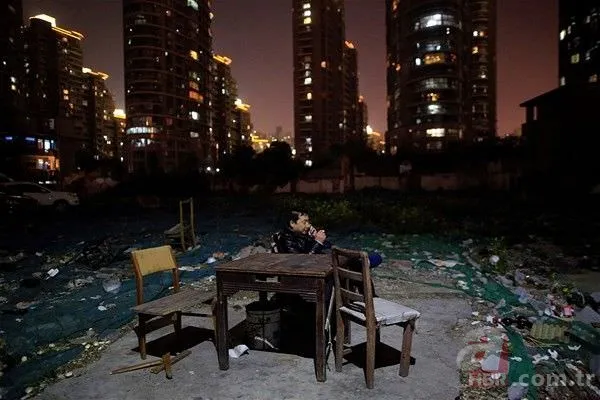 Evlerini yıktırmayarak gökdelenere direnen mahalleden 15 kare 8