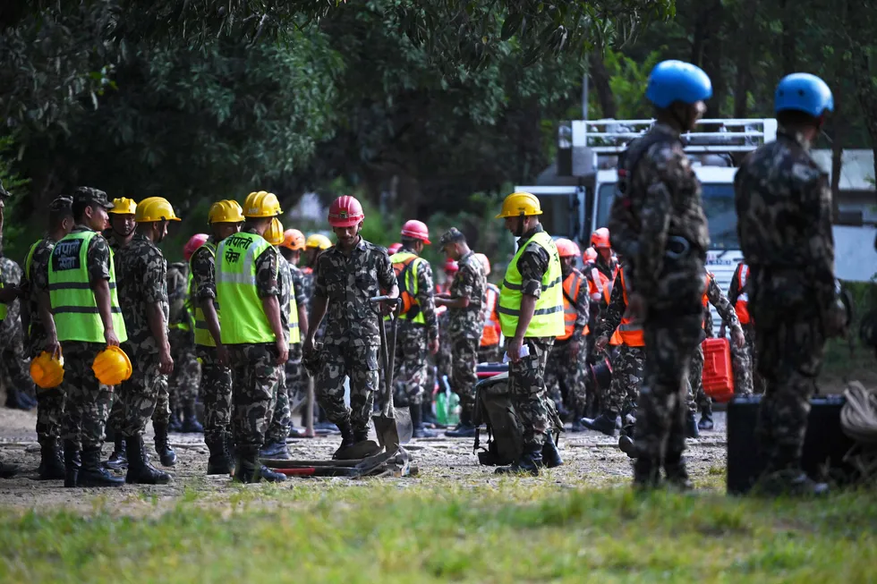 nepalden-tibetteki-baraj-patlamasi-sonrasi-alarm-kurtarma-ekipleri-ve-halka-guvenli-bolgeye-gecin-cagrisi-1787901050956.jpg Nepal (AFP)