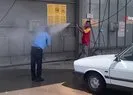 Serinlemek için oto yıkamaya gittiler!
