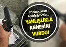 Tabancasını temizlemek isterken annesini vurdu