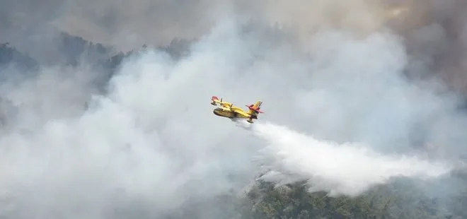 Uçakların alevlerle savaşı! Muğla’daki yangına havadan müdahale