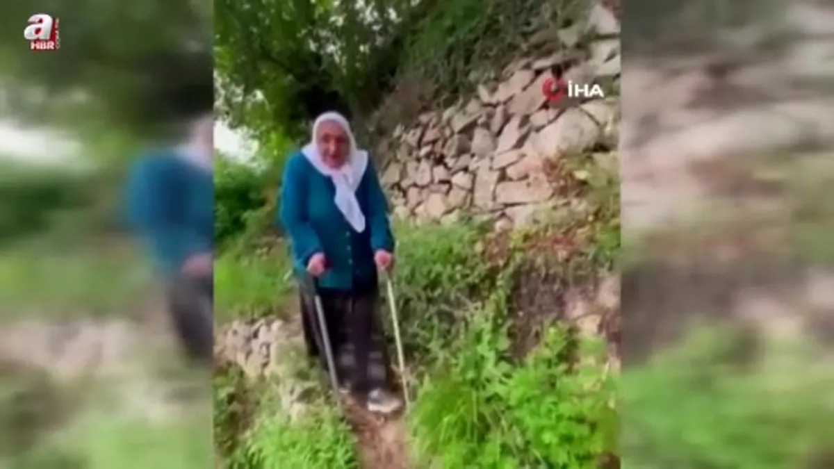 Rize'de 400 metre patika yoldan koltuk değnekleri ile yürüyor