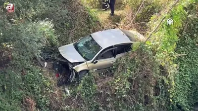 Dere yatağına düşen araçtaki 2 kişi yaralandı