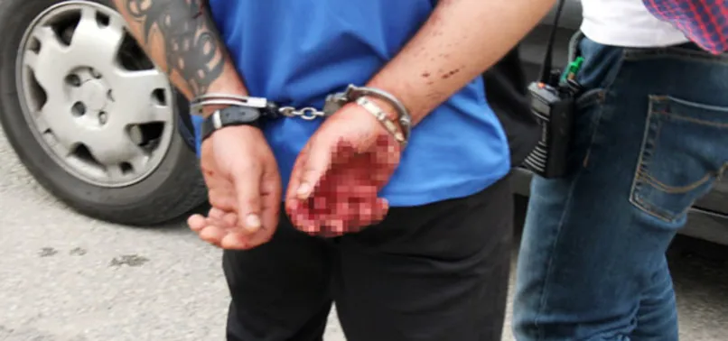 Kocaeli'de eşinin boğazını kesen adam yakalandı