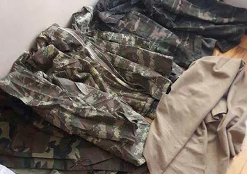 FETÖ'nün öğrenci evinden askeri kamuflaj ve bot çıktı
