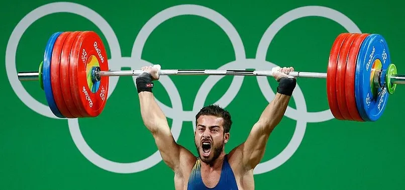 İranlı halterci Rostami'den dünya rekoru