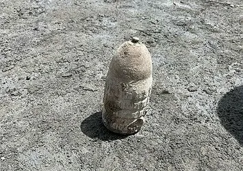 Kars'ta temel kazısı sırasında şoke eden olay! Patlamamış top mermisi bulundu
