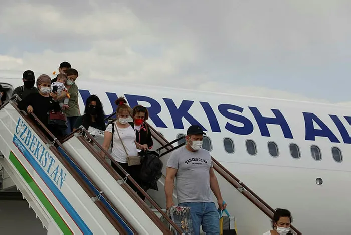 THY'nin İstanbul-Fergana seferini yapan ilk tarifeli uçağı Özbekistan'da törenle karşılandı - 3