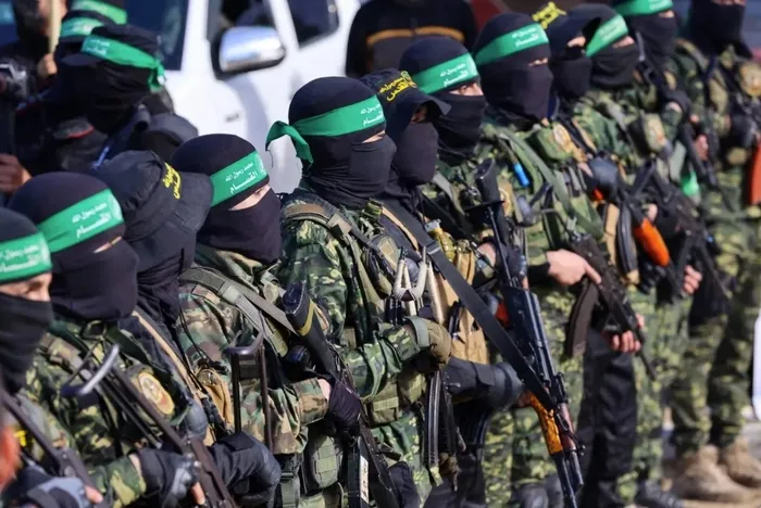 abdden-gazzelileri-tahliye-plani-trump-duyurdu-misir-ve-urdune-surgun-filistinden-yanit-gecikmedi-1737887234159.jpg Hassam'ın askeri kanadı İzzeddin El Kassam Tugayları Gazze anlaşması kapsamında rehine takasını gerçekleştirirken (AFP)