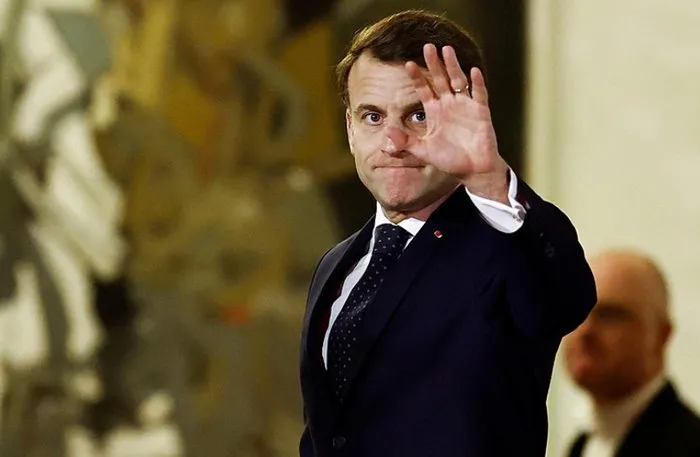 Macron Paris Güvenlik Zirvesi sonrası Avrupalı liderleri uğurlarken (AFP)