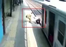 Mucize kurtuluş kamerada! Trenin altında kalmaktan polis kurtardı