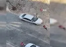 Gözü dönen kadın arabayı taş yağmuruna tuttu