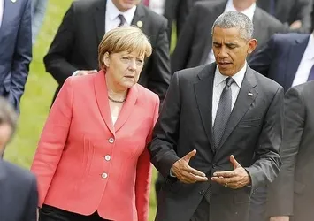 Obama ve Merkel'den Rusya ile Esed rejimine kınama