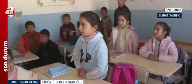 munbicte-egitim-hayati-yeniden-canlandi-terorun-izleri-siliniyor-1734689084110.jpg Çocuklar geleceğe umutla bakıyor! (Ekran görüntüsü / A Haber)