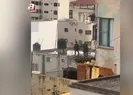 İşgalci İsrail askerleri Filistinli şehitleri çatıdan attı!