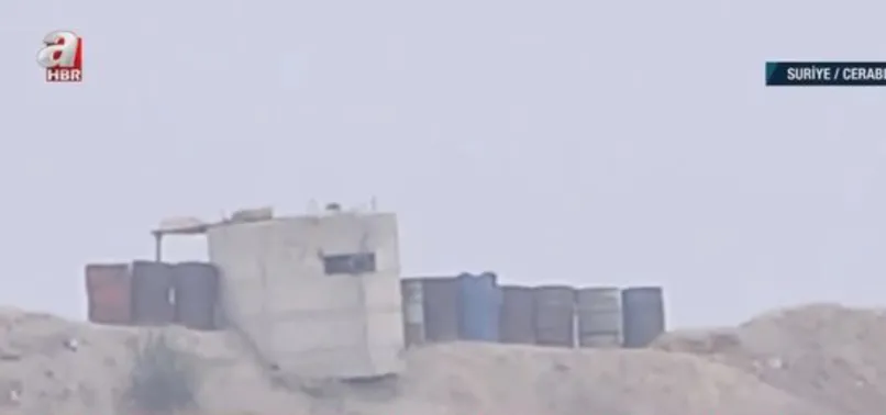 CHP'nin tezkereye hayır dediği bölgelerde teröristler cirit atıyor! A Haber Cerablus'ta terör mevzilerini görüntüledi