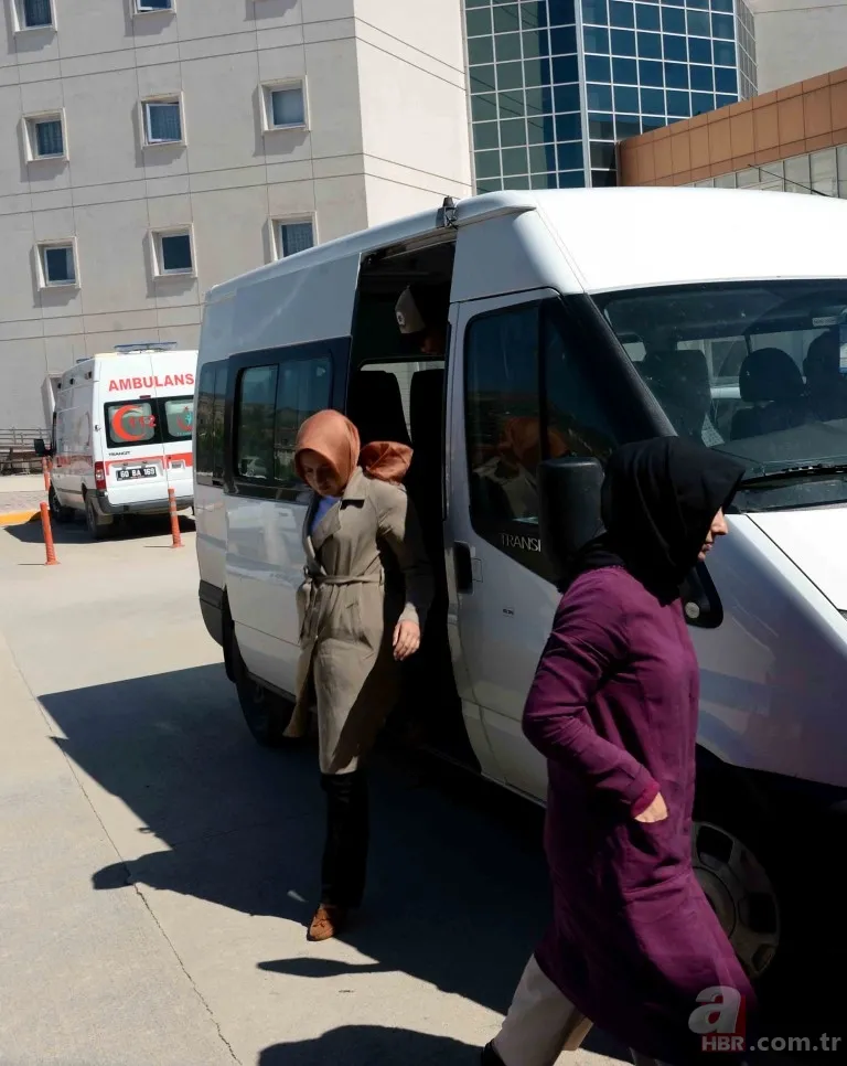 FETÖ operasyonunda yakalanan kadın objektiflere gülerek poz verdi 3