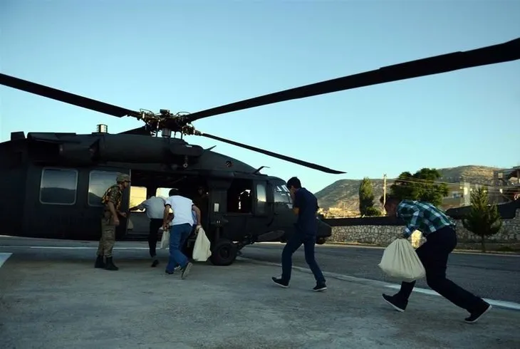 Oy pusulaları helikopterle taşındı