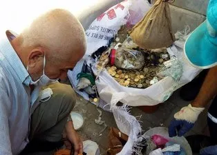 Kötü koku gelen evden 170 bin TL'lik kağıt ve madeni para çıktı
