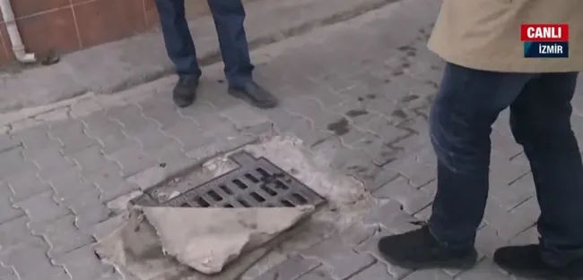 Bornova'da pis koku yayılıyor! Vatandaşlar kokuya karşı mazgalları kilimle kapattı - 2