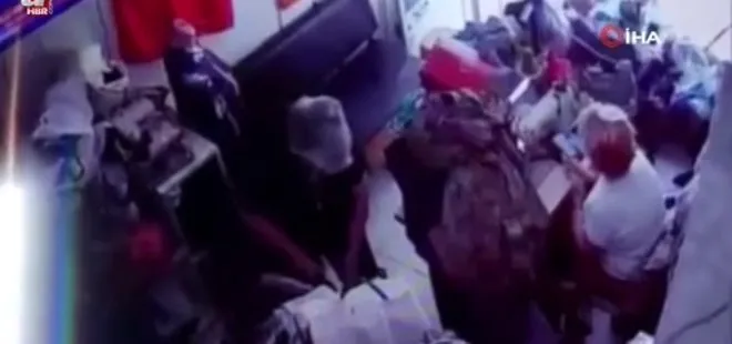 Baba-oğul kadın terzinin iş yerini basıp darp etti o anlar kamerada