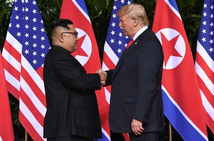 kuzey-koreden-abdye-tehdit-caydirici-guc-kullaniminda-yeni-bir-rekora-imza-atariz-1741077864887.jpg Kuzey Kore Lideri Kim Jong Un ve ABD Başkanı Donald Trump (Arşiv)