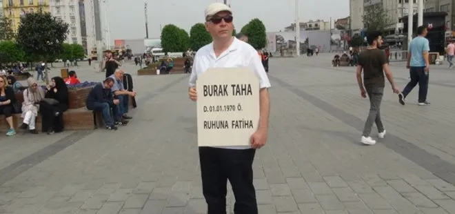 Taksim’de elinde mezar taşıyla gezdi