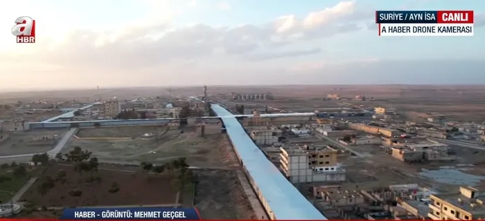 suriye-ayn-isada-teroristleri-hava-harekati-panigi-demir-tentelerle-onlem-almaya-calistilar-1770651719359.jpg Suriye Ayn İsa'da teröristlerin hava harekatı paniği: Demir tentelerle önlem almaya çalıştılar - 2