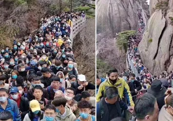 Çin'de karantina yasakları hafifletildi! 20 bin kapasiteli park hıncahınç doldu!