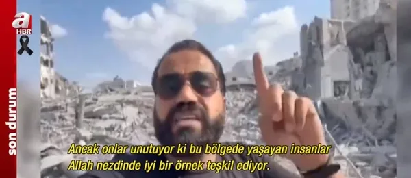 Filistinli erkek Gazze’deki yıkıntıların içinde İsrail’e meydan okudu