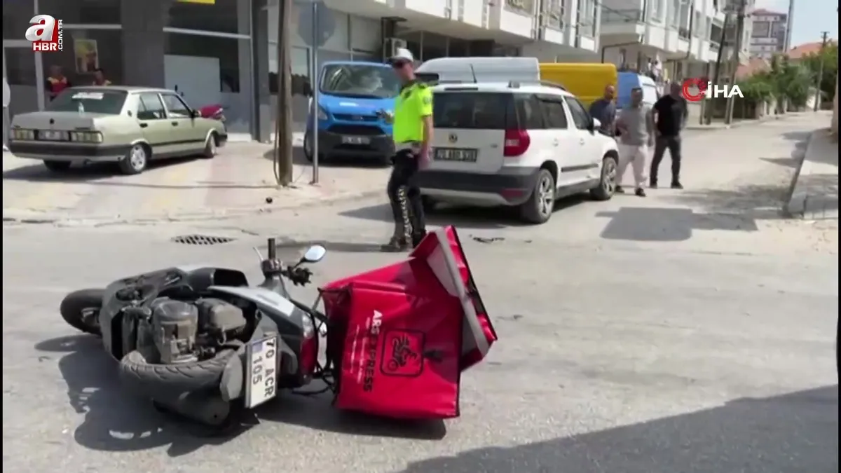 Otomobille çarpışan motokurye yaralandı
